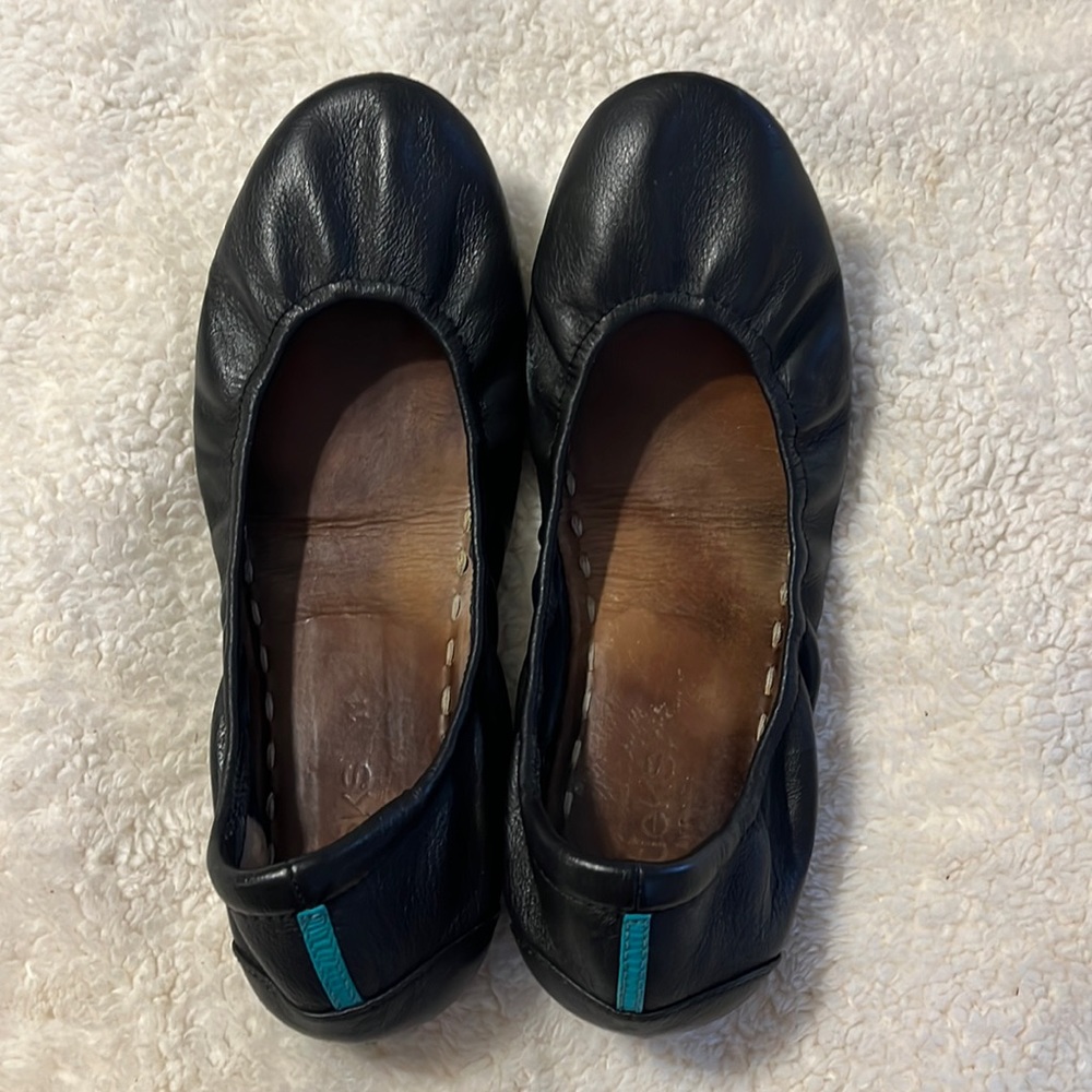 Tieks black flats, good used condition